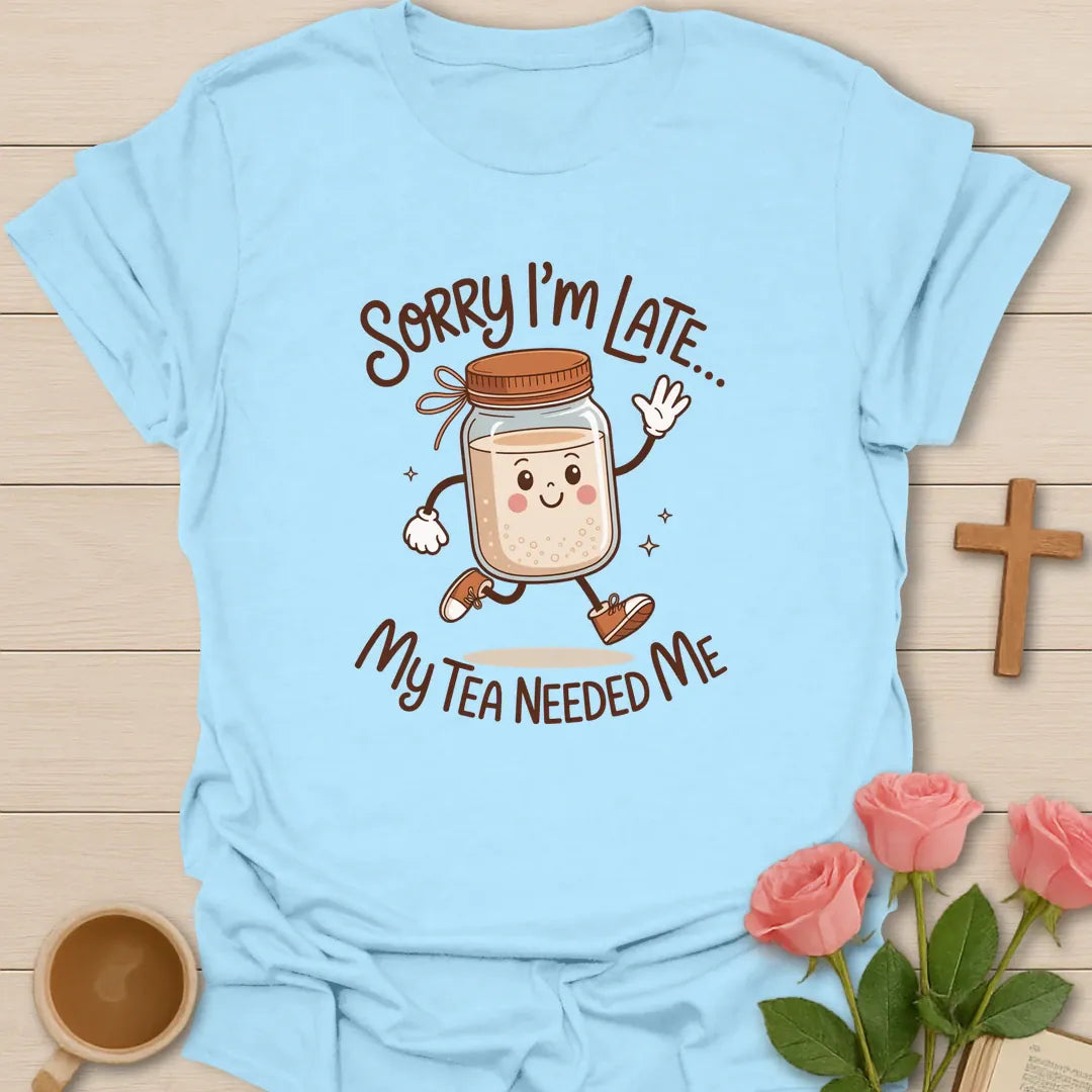 My Tea Needs Me shirt with teacup, playful lettering, and faith-inspired design. - Light Blue