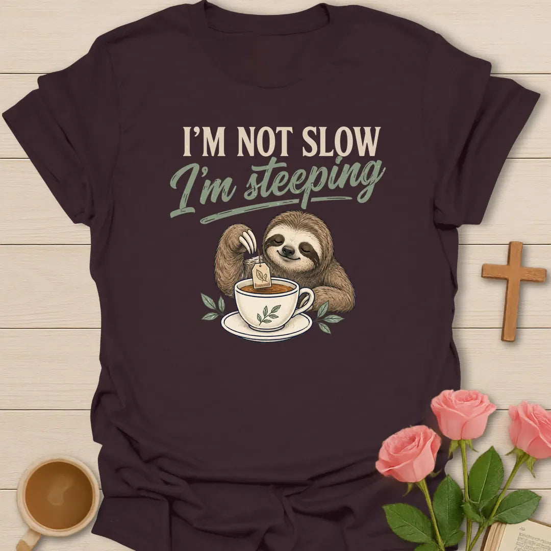 Not Slow Steeping Sloth shirt with cute sloth, teacup, and playful cream lettering. - Dark Chocolate