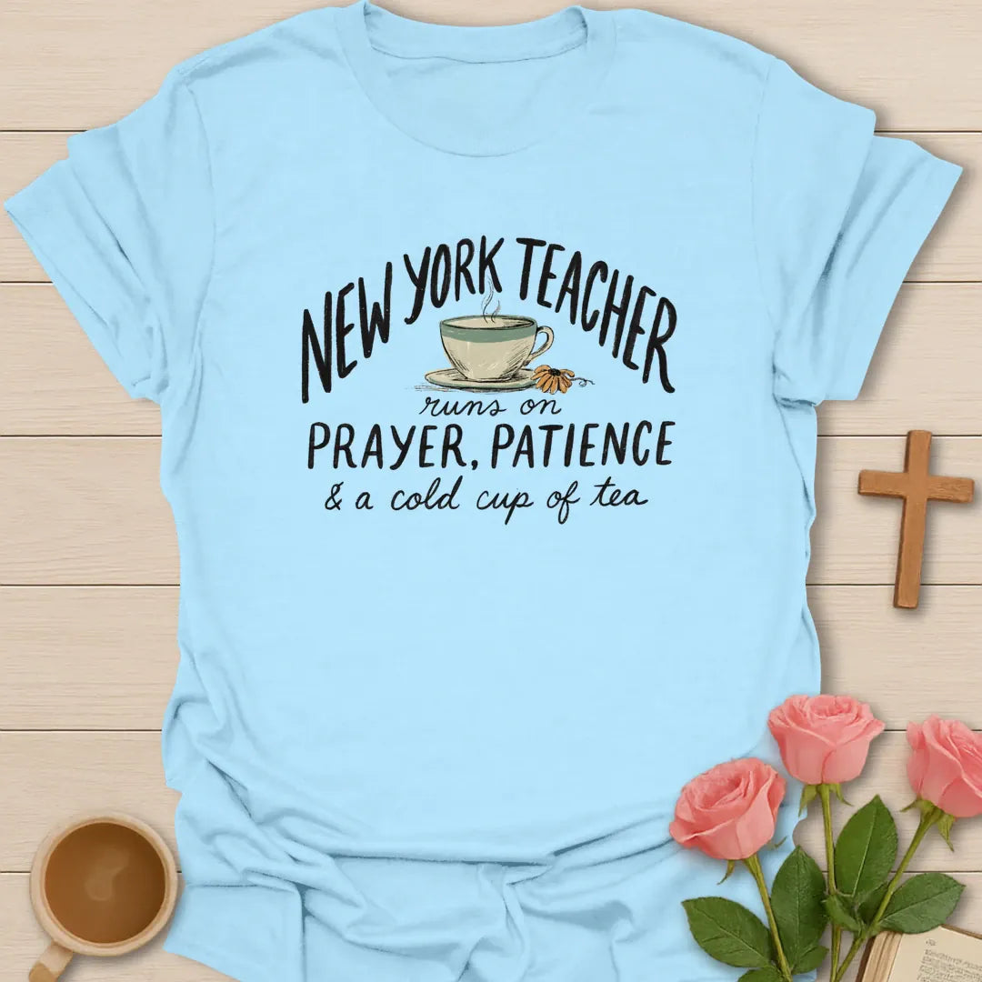 NY Teacher Runs On Prayer Patience and Cold Tea shirt with teacup, sunflower accent, muted sage and black distressed lettering. - Light Blue