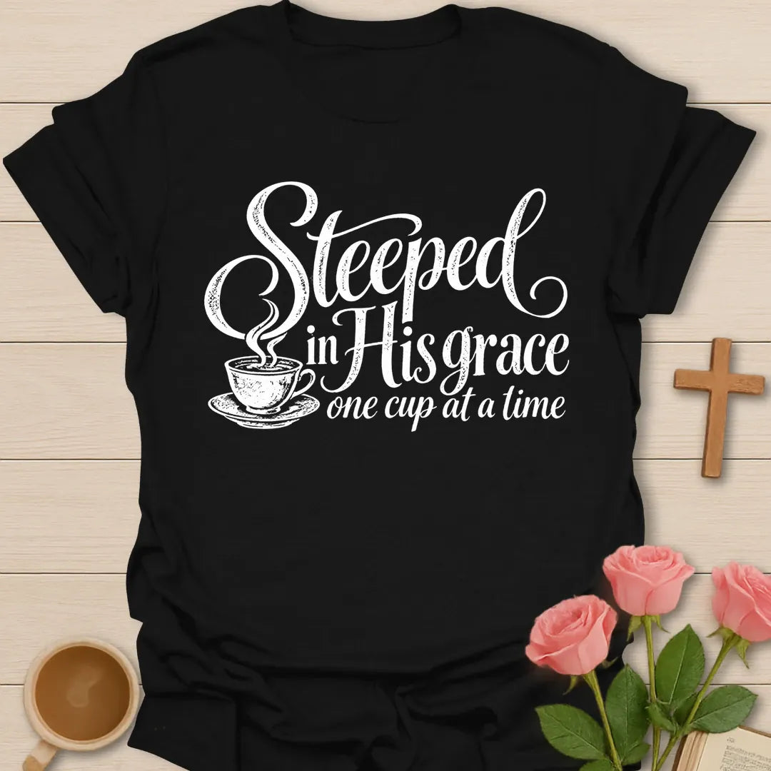 Steeped In His Grace One Cup At A Time Christian t-shirt in flowing script with a steaming teacup - Black