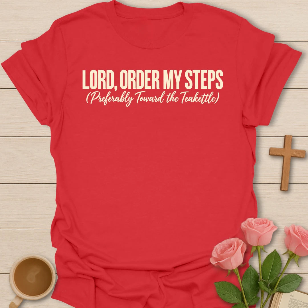 Lord, Order My Steps (Preferably Toward the Teakettle) t-shirt with bold cream lettering and a script subtitle - Red