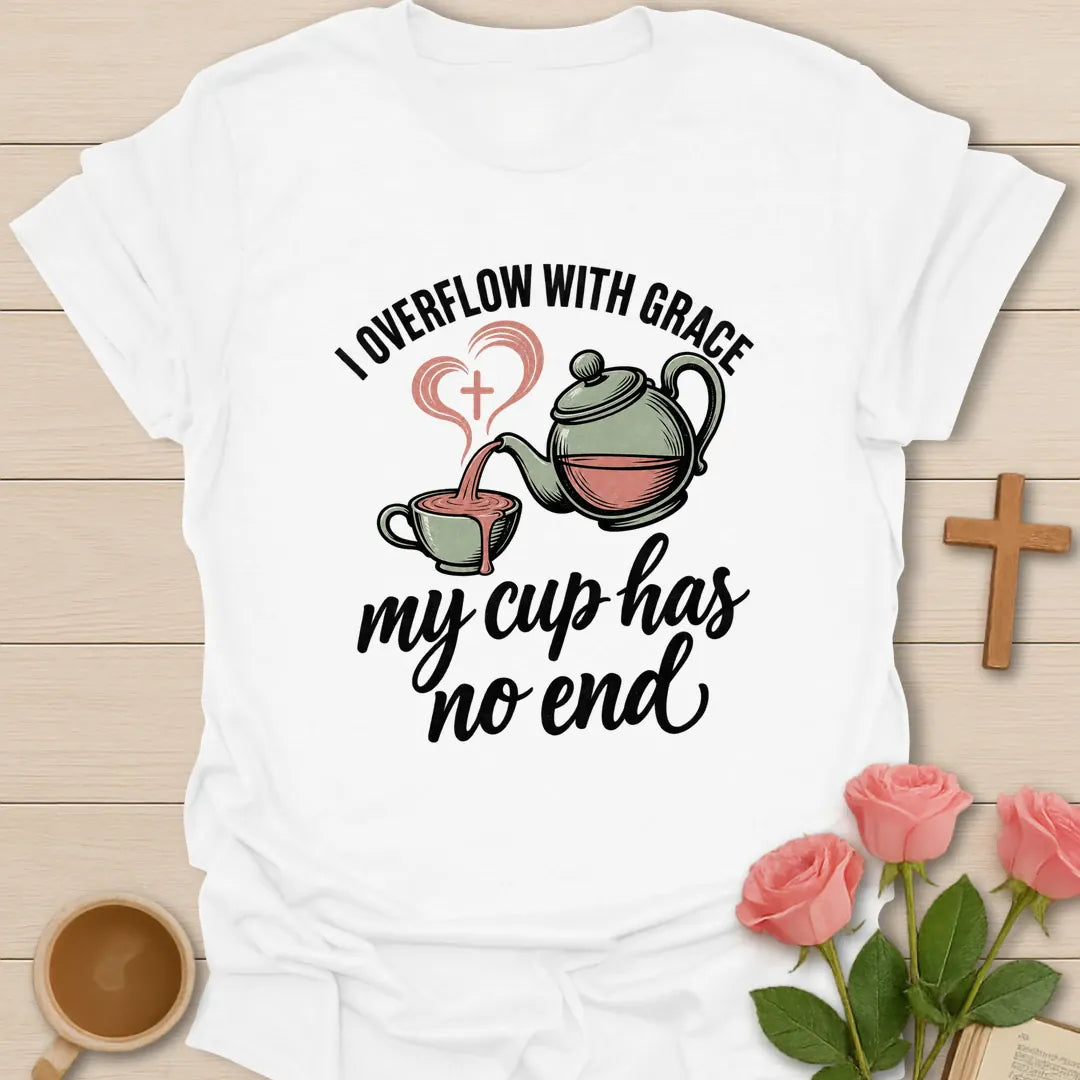 Overflowing Cup shirt with warm lettering and a faith-inspired teacup design. - White