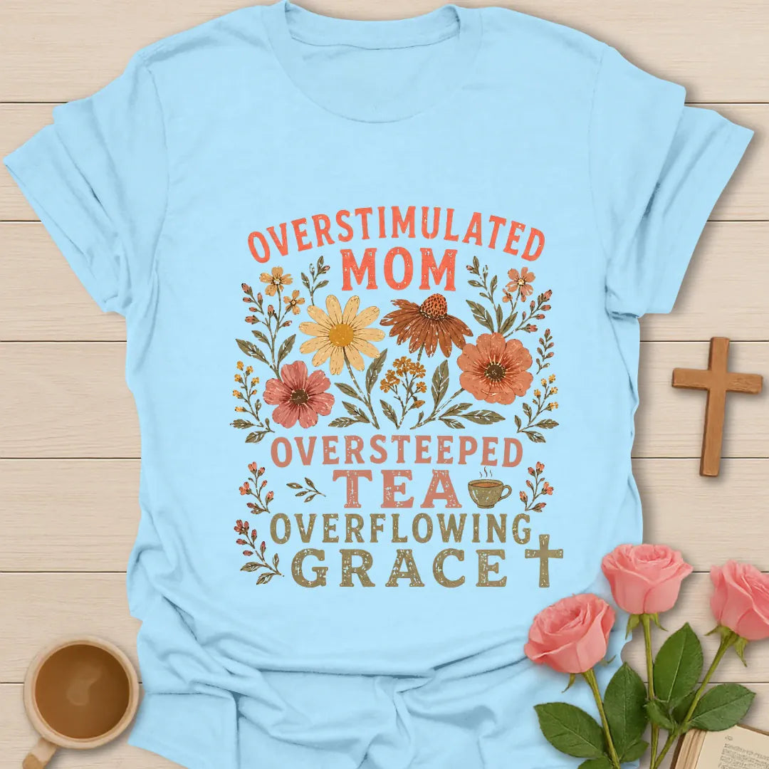 Overstimulated Oversteeped Overflowing Mom shirt with teacup, playful lettering, and faith design. - Light Blue