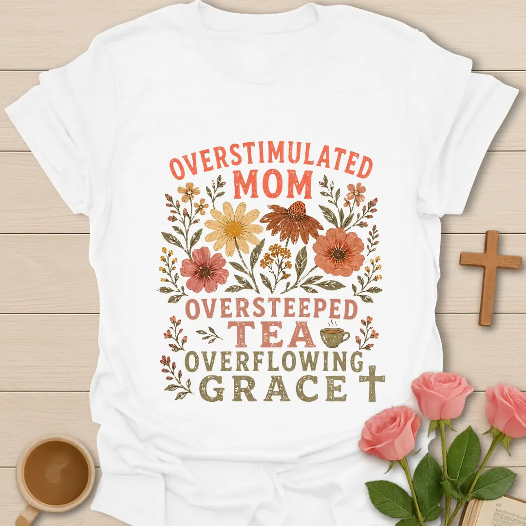 Overstimulated Oversteeped Overflowing Mom shirt with teacup, playful lettering, and faith design. - White