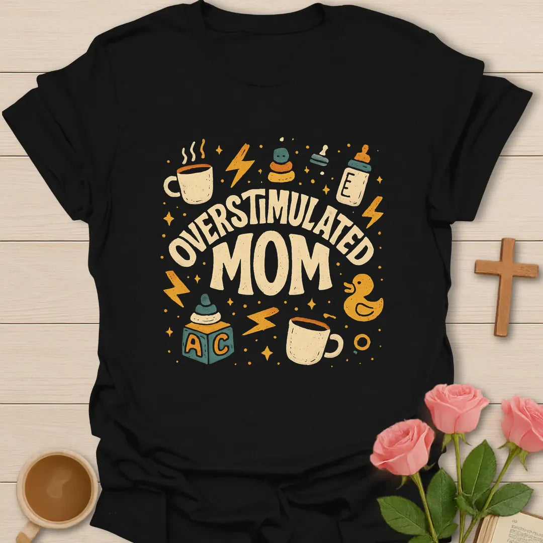 Overstimulated Tea Mom shirt with teacup, playful lettering, and faith-inspired design. - Black