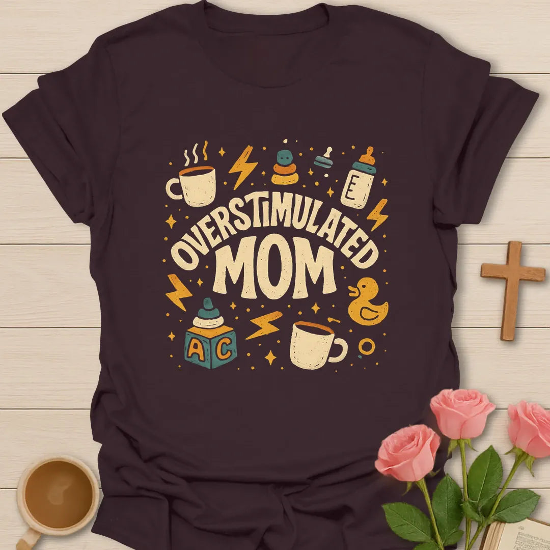 Overstimulated Tea Mom shirt with teacup, playful lettering, and faith-inspired design. - Dark Chocolate