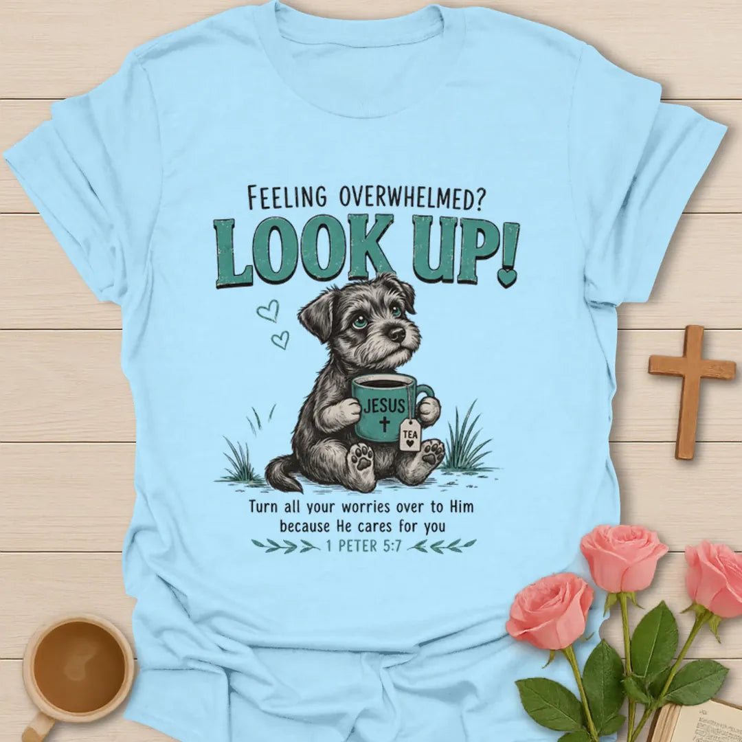 Look Up Christian shirt with cute dog holding Jesus tea mug and 1 Peter 5:7 encouragement text. - Light Blue