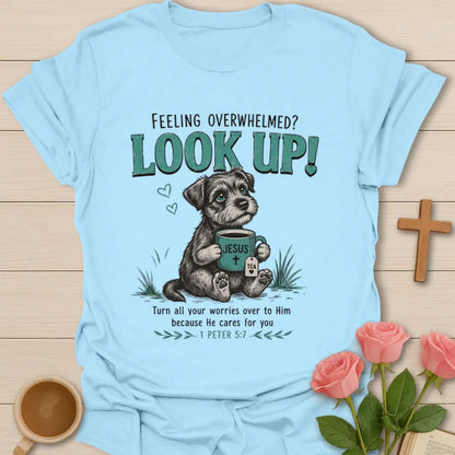 Look Up Christian shirt with cute dog holding Jesus tea mug and 1 Peter 5:7 encouragement text. - Light Blue