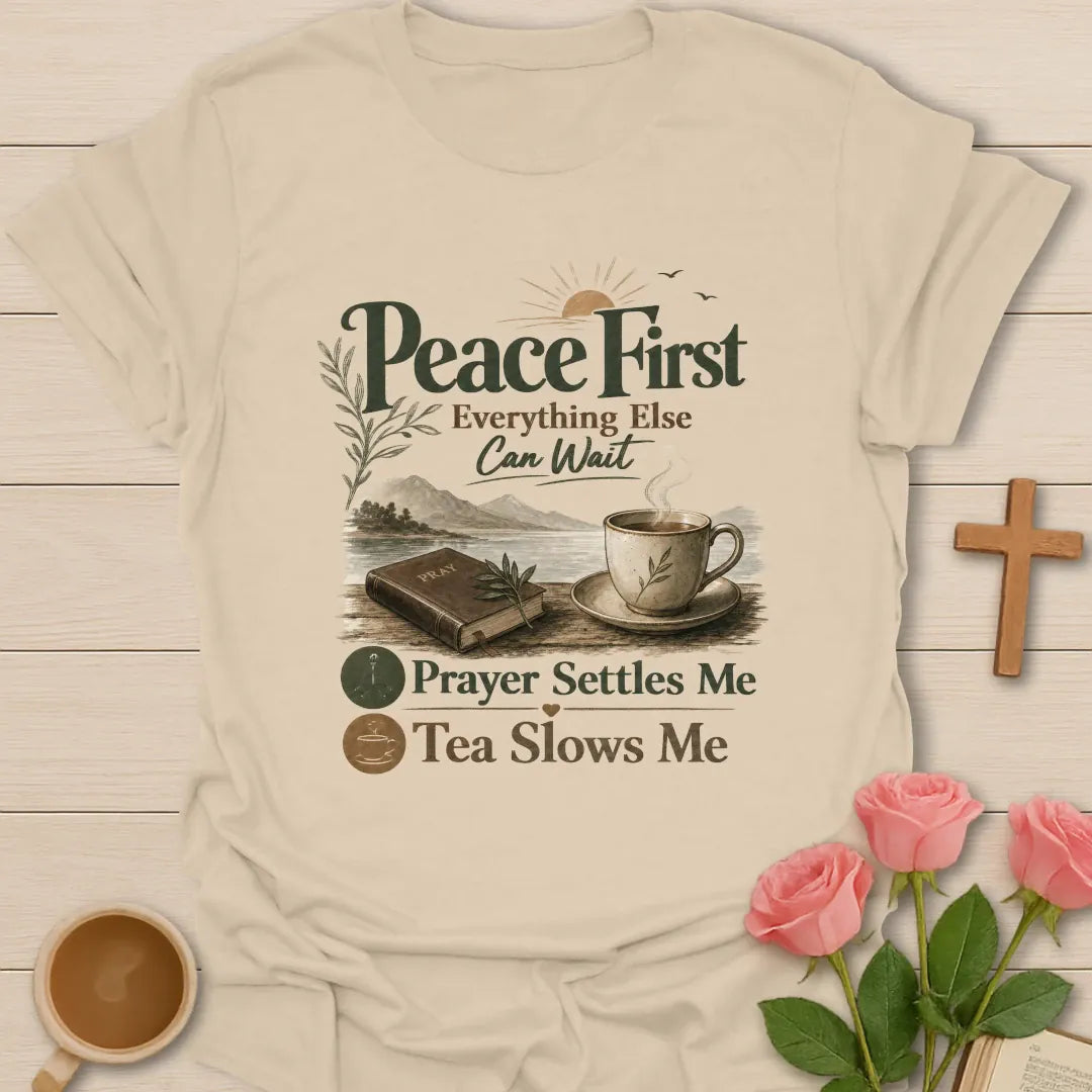 Peace First Christian tea shirt with faith-inspired lettering design - Sand