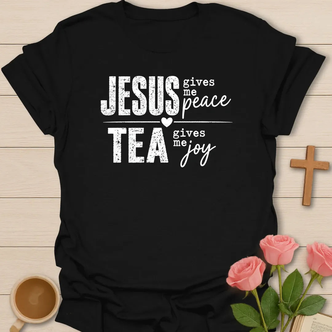 Jesus Gives Me Peace Tea Gives Me Joy shirt with distressed white lettering, heart divider, and bold stacked typography. - Black