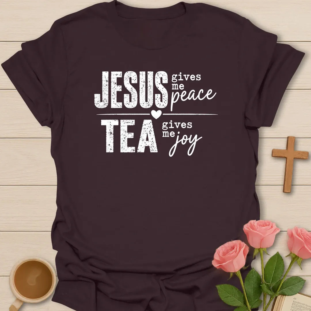 Jesus Gives Me Peace Tea Gives Me Joy shirt with distressed white lettering, heart divider, and bold stacked typography. - Dark Chocolate