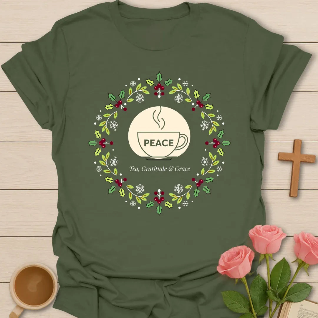 Peace Tea Gratitude and Grace shirt with teacup, wreath, holly berries, snowflakes, and peaceful Christmas design. - Military Green