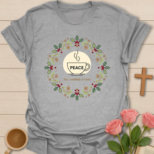 Peace Tea Gratitude and Grace shirt with teacup, wreath, holly berries, snowflakes, and peaceful Christmas design. - Sport Grey