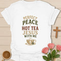Perfect Peace Hot Tea Jesus With Me shirt with steaming teacup, cross and tea tag - White