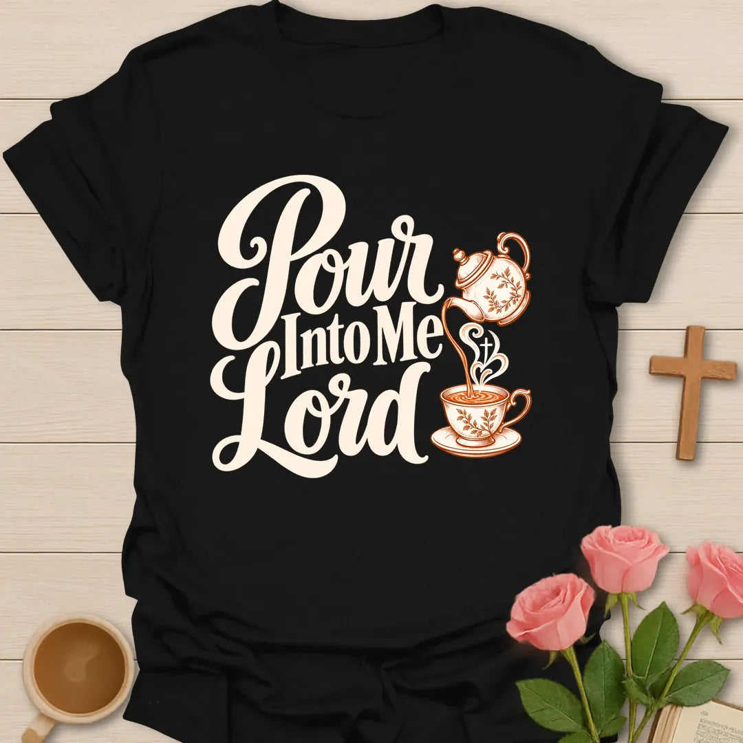 Pour Into Me Lord script Christian t-shirt with a floral teapot pouring into a teacup marked with a cross - Black