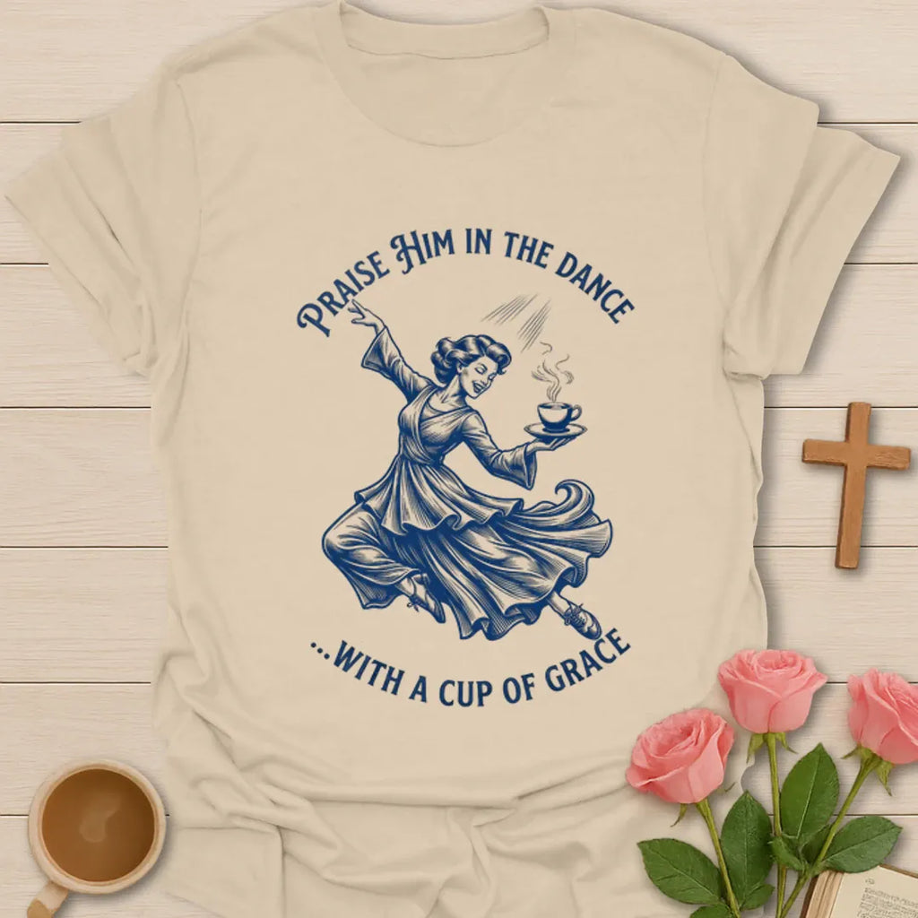 Praise Him In The Dance shirt with blue dancing woman holding a cup of tea and circular lettering. - Sand