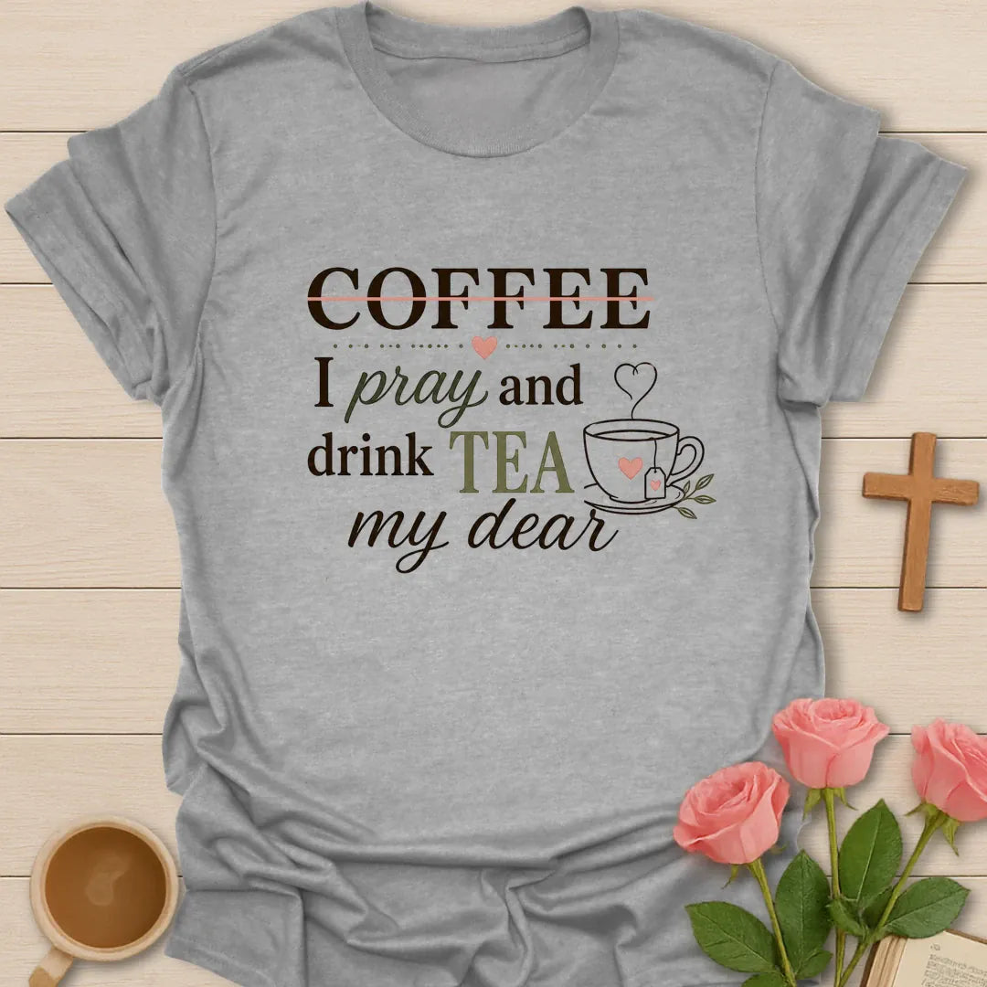 Pray and Drink Tea shirt with teacup, praying hands, and cream vintage lettering. - Sport Grey