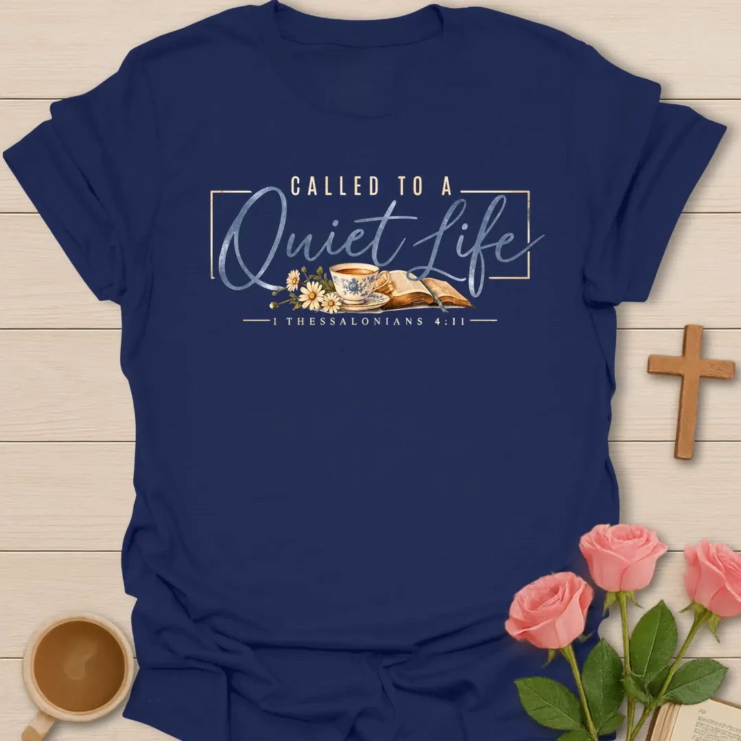 Called to a Quiet Life Christian t-shirt with blue script, a china teacup, daisies, an open Bible and 1 Thessalonians 4:11 - Navy