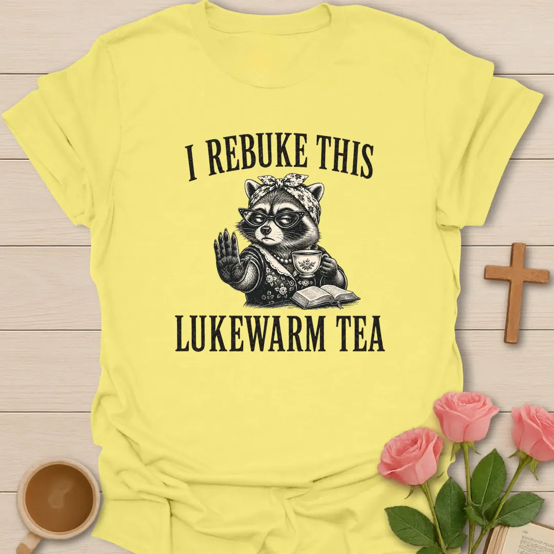 Rebuke Lukewarm Tea shirt with teacup, playful lettering, and faith-inspired design. - Cornsilk