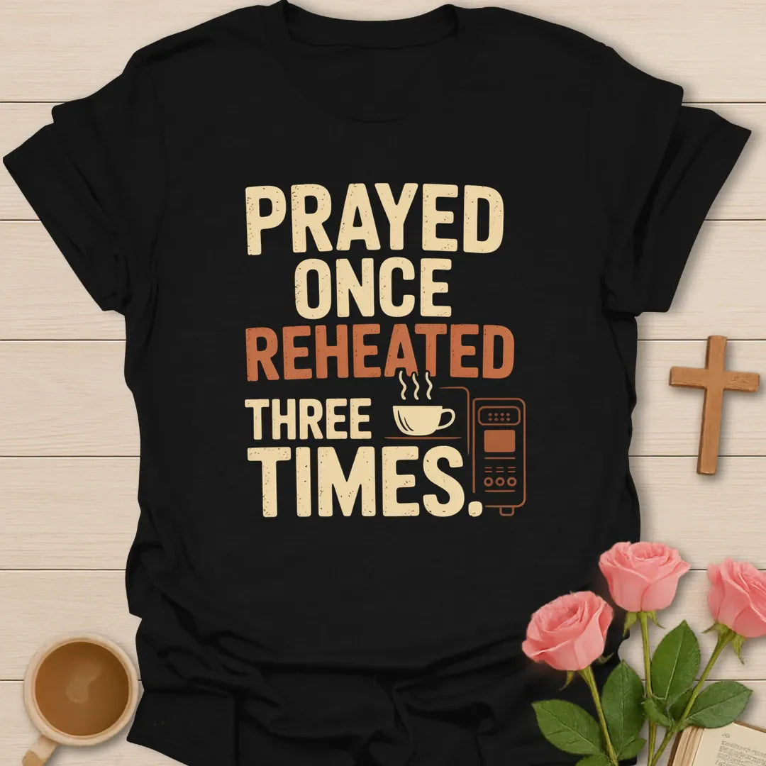 Reheated Three Times shirt with playful lettering and faith-inspired tea design. - Black
