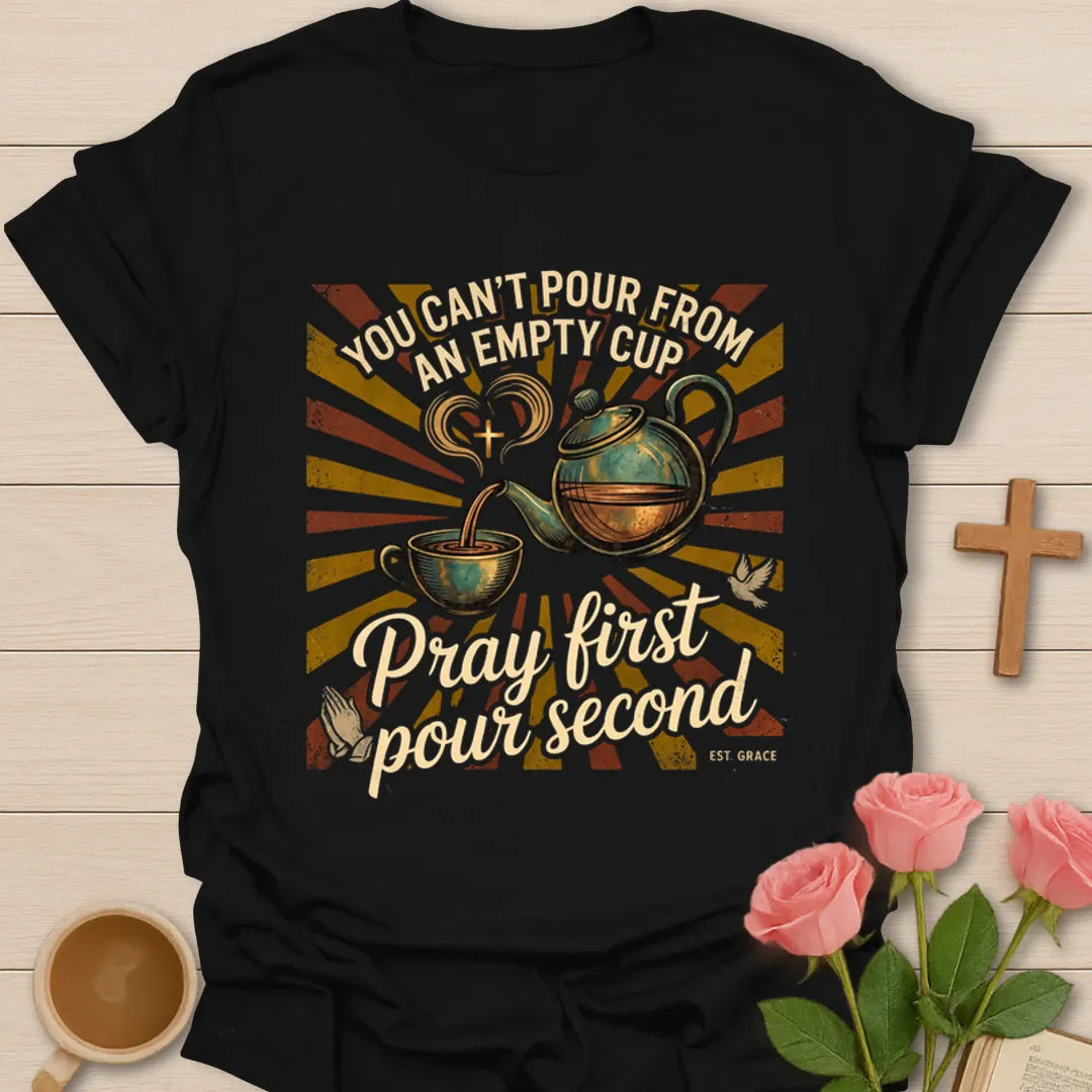White print Christian tea shirt with You Can’t Pour From An Empty Cup and Pray First Pour Second phrase - Black