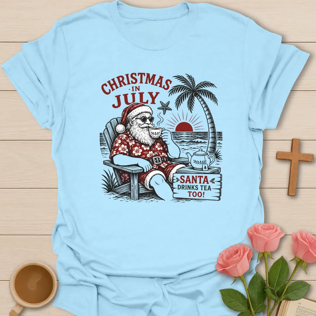 Santa Drinks Tea Too shirt with Santa, teacup, tropical beach accents, and playful Christmas lettering. - Light Blue