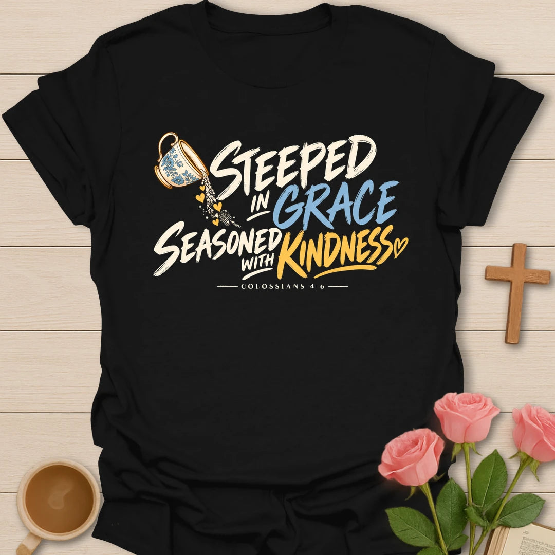 Steeped in Grace Seasoned with Kindness colorful Christian t-shirt with a pouring blue floral teacup and Colossians 4:6 - Black