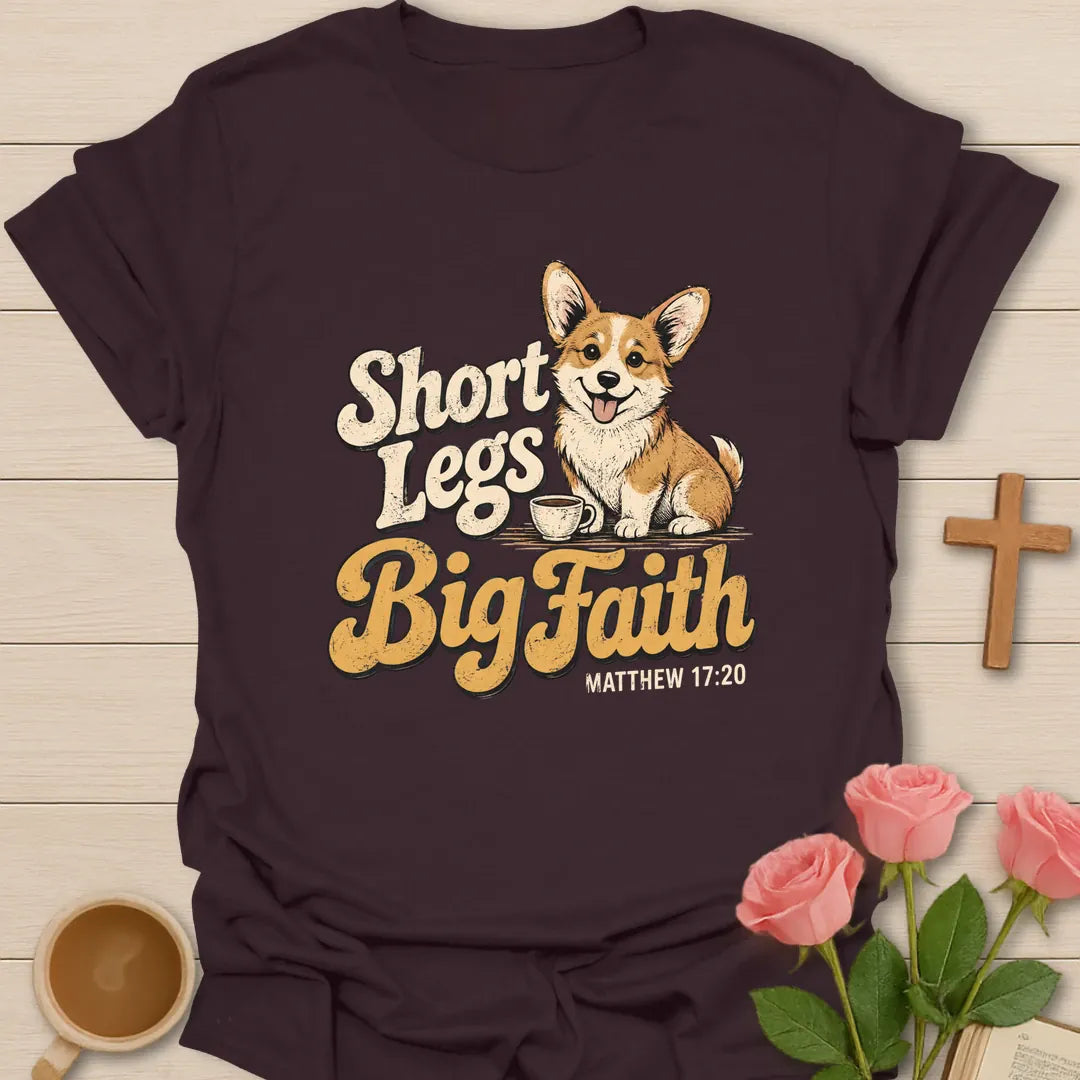Short Legs Big Faith Christian t-shirt with a smiling corgi puppy beside a teacup in retro lettering and Matthew 17:20 - Dark Chocolate
