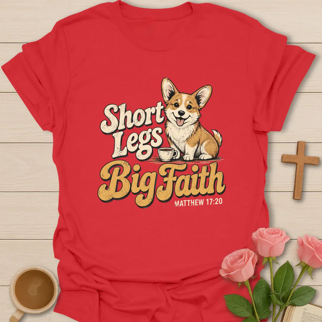 Short Legs Big Faith Christian t-shirt with a smiling corgi puppy beside a teacup in retro lettering and Matthew 17:20 - Red