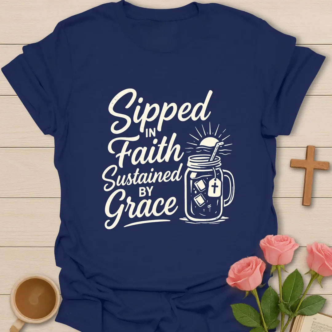 Sipped Faith Grace shirt with teacup, cross, and cream vintage lettering. - Navy