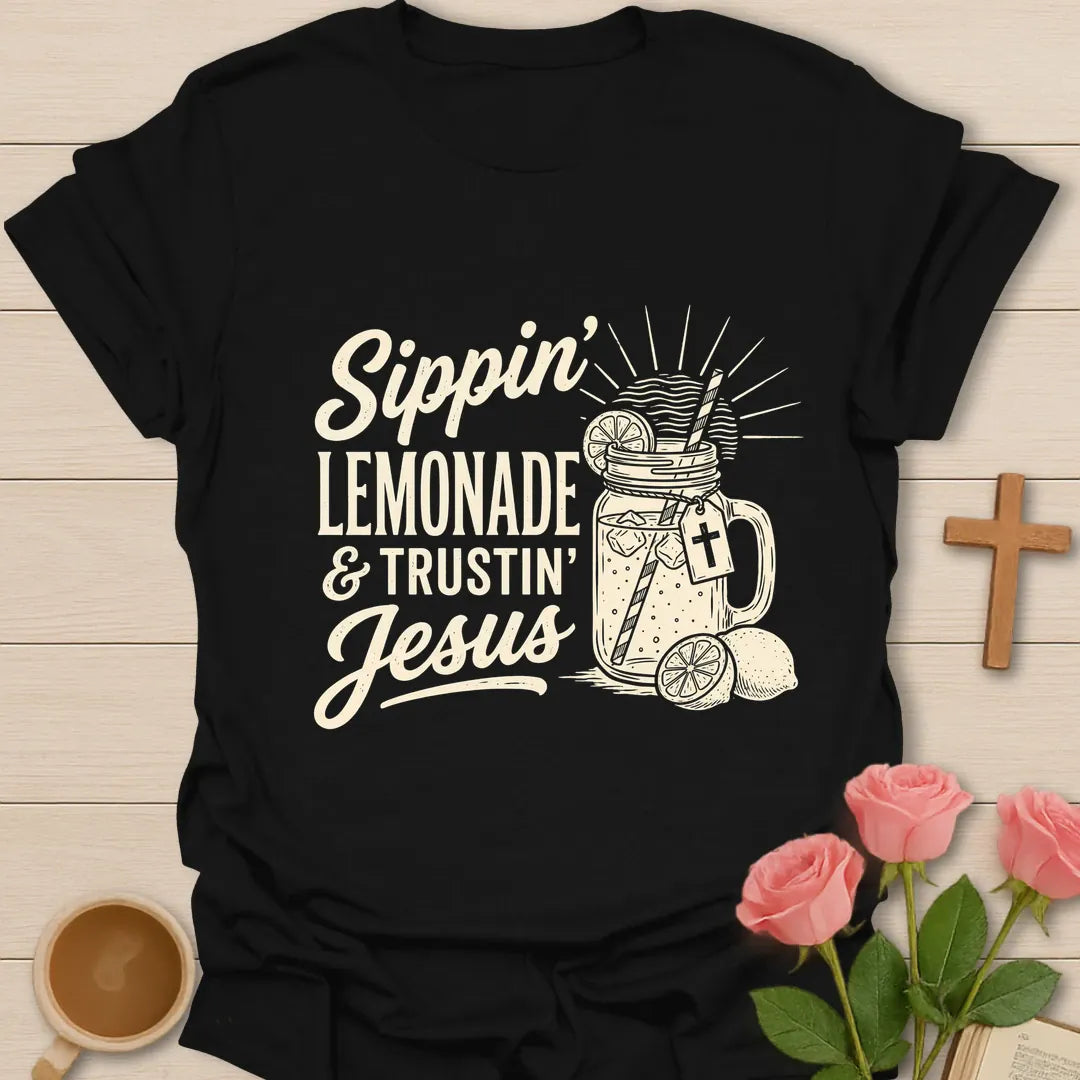 Sippin Lemonade and Trustin Jesus shirt with lemonade glass, cross, and cream vintage lettering. - Black