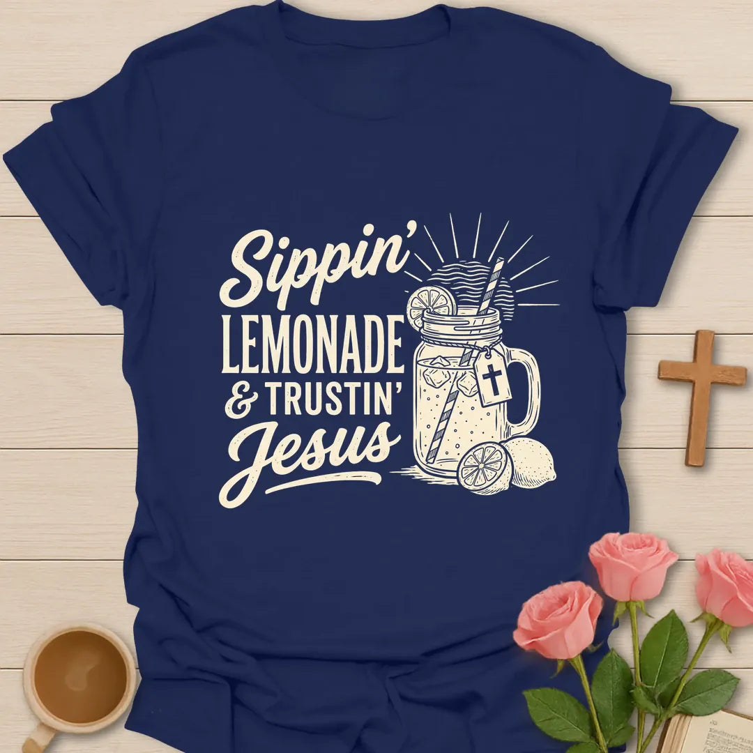 Sippin Lemonade and Trustin Jesus shirt with lemonade glass, cross, and cream vintage lettering. - Navy