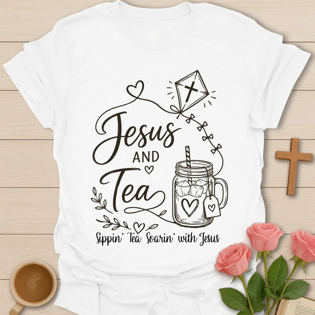 Jesus and Tea shirt with mason jar iced tea, kite with cross, hearts, leaves, and Sippin Tea Soarin With Jesus text. - White