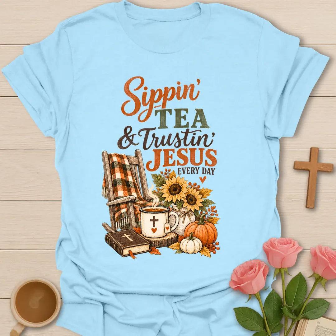 Sippin and Trustin shirt with cozy lettering and a faith-inspired fall tea design. - Light Blue