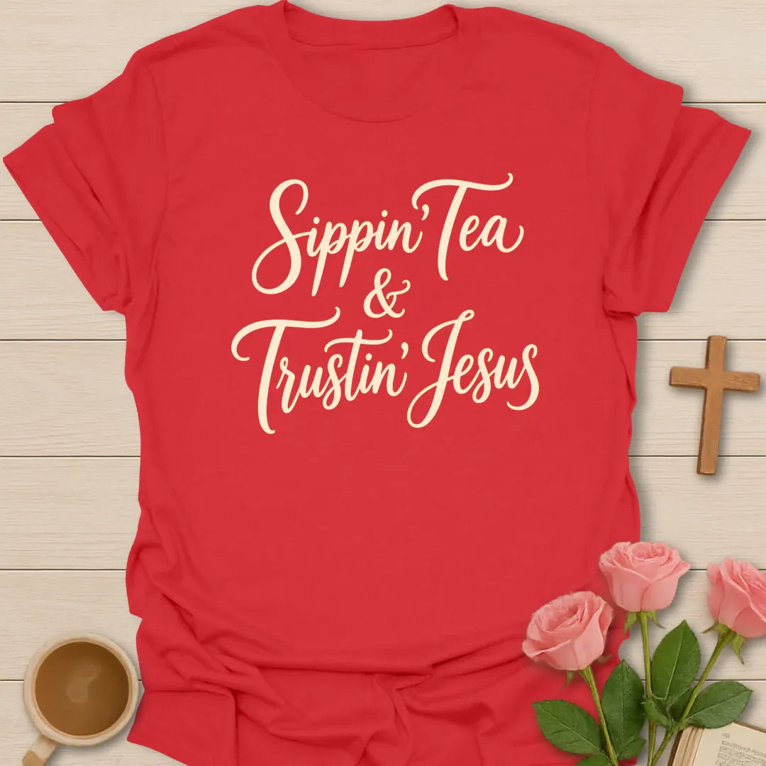 Sippin and Trustin Jesus shirt with teacup, cross, and cream vintage lettering. - Red