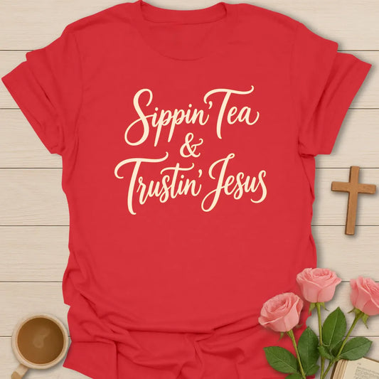 Sippin and Trustin Jesus shirt with teacup, cross, and cream vintage lettering. - Red