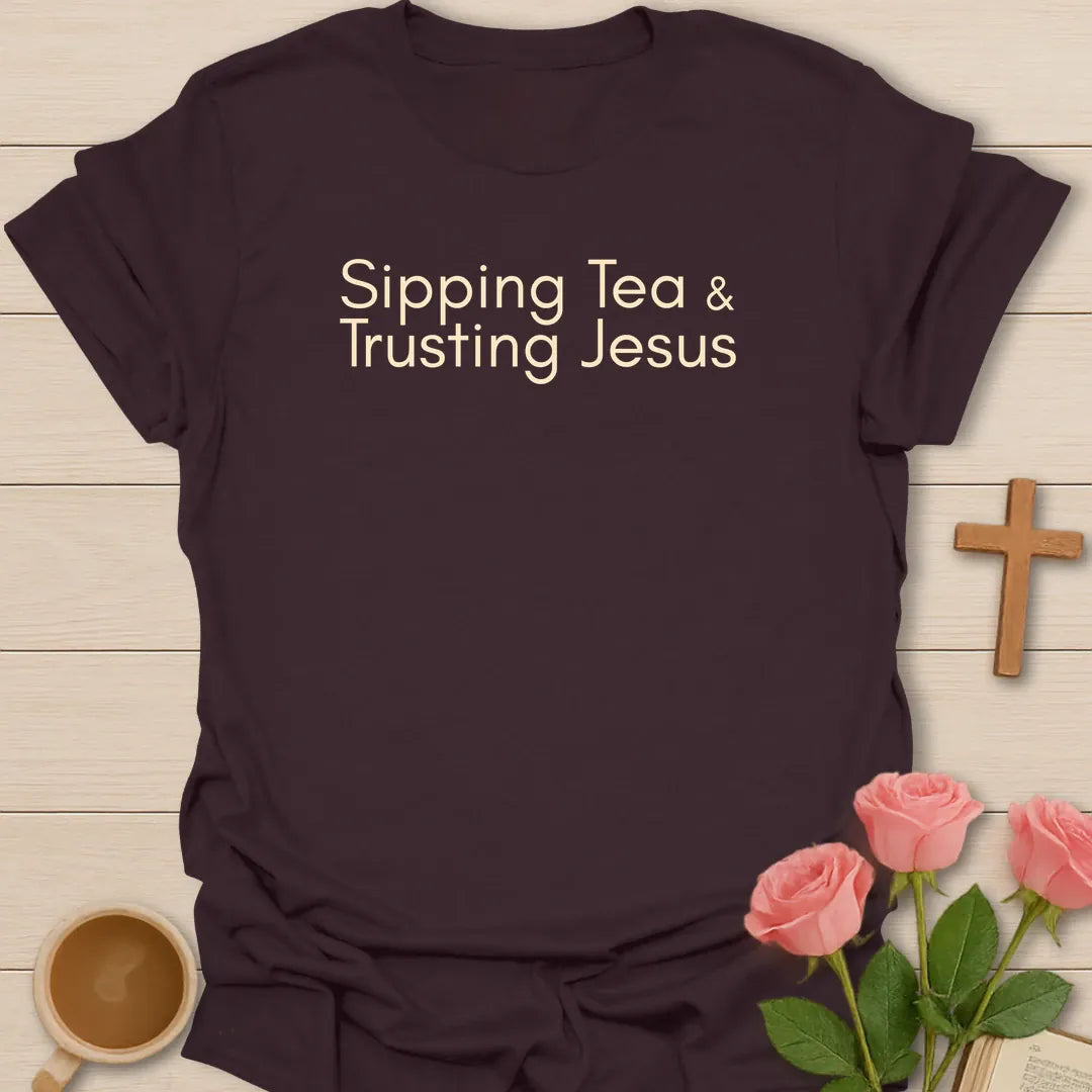 Sipping Tea and Trusting Jesus shirt with minimal cream typography on black background style. - Dark Chocolate