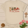 Southern Tis The Season shirt with mason jar sweet tea, Christmas tree, present, Santa hat, stars, and red vintage text. - Sand
