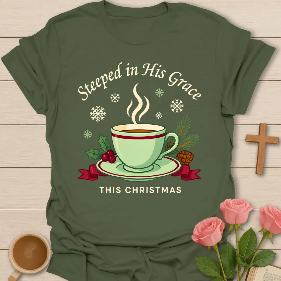 Steeped in His Grace Christmas shirt with green teacup, holly, pine, snowflakes, and cream lettering. - Military Green
