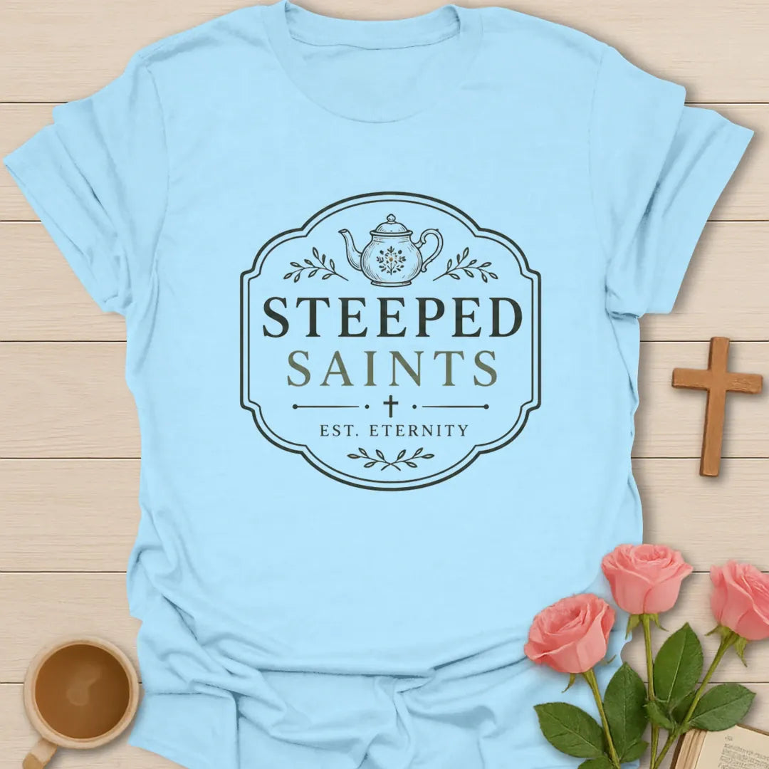 Steeped Saints shirt with teacup, cross, and cream vintage lettering. - Light Blue