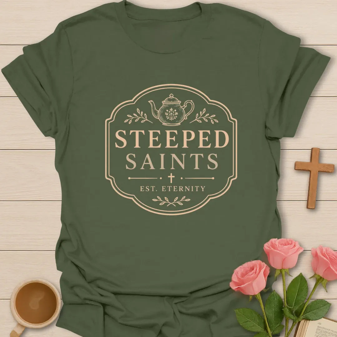 Steeped Saints shirt with teacup, cross, and cream vintage lettering. - Military Green