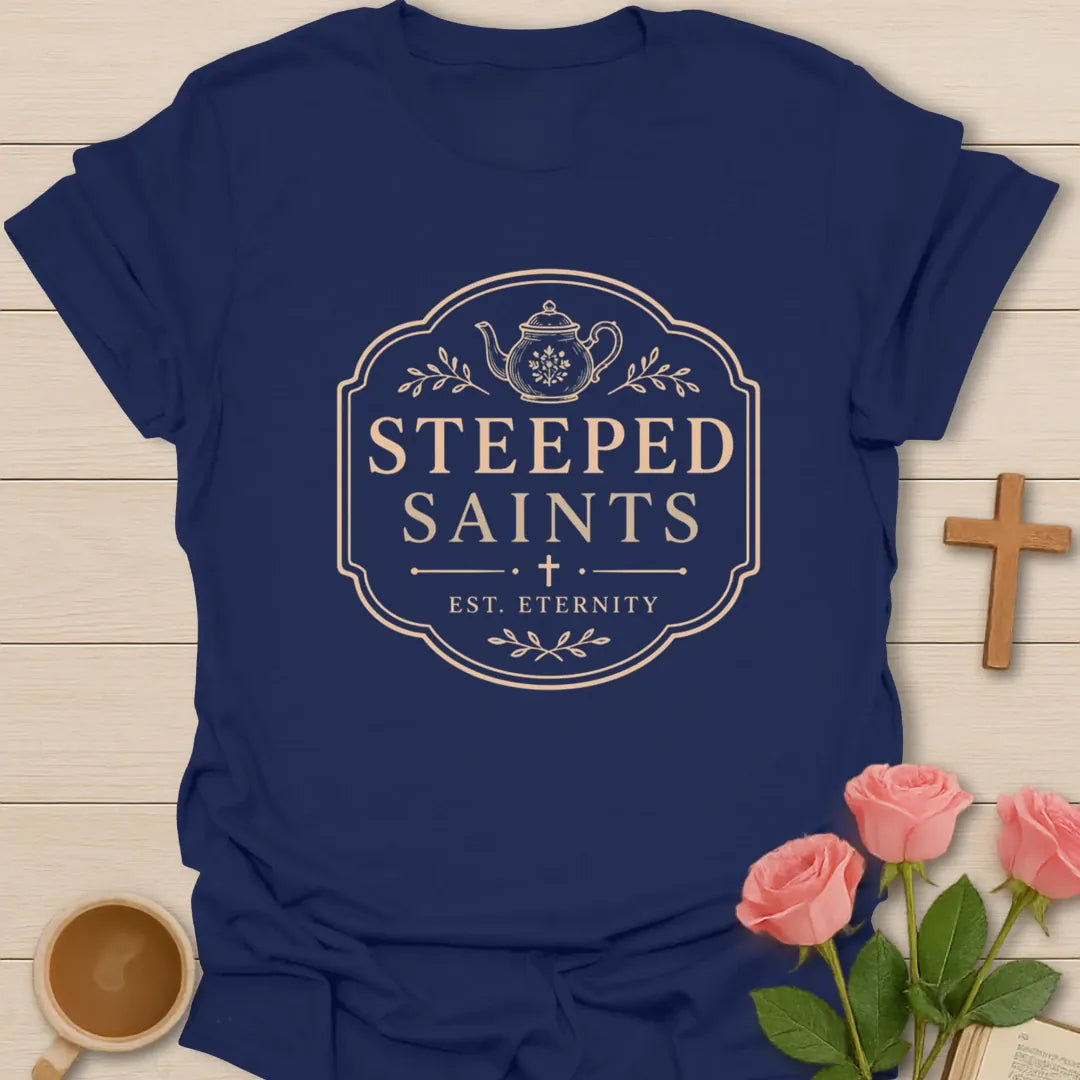 Steeped Saints shirt with teacup, cross, and cream vintage lettering. - Navy