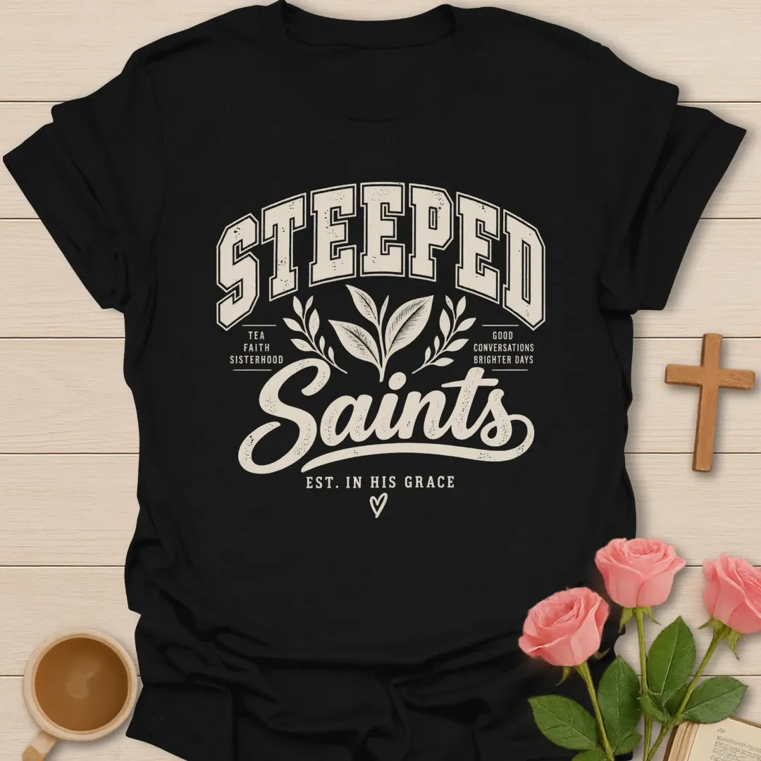 Steeped Saints T-Shirt with tea-inspired lettering and faith design. - Black
