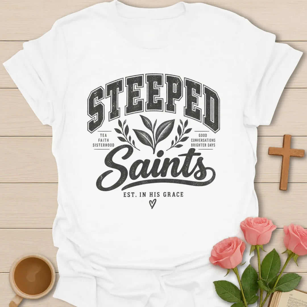 Steeped Saints T-Shirt with tea-inspired lettering and faith design. - White