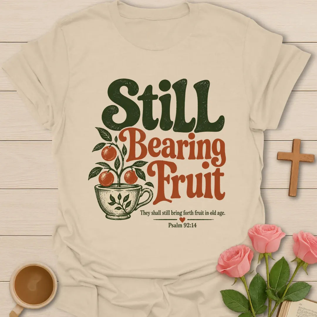 Still Bearing Fruit vintage Christian t-shirt with an orange fruit tree growing from a teacup and Psalm 92:14 - Sand