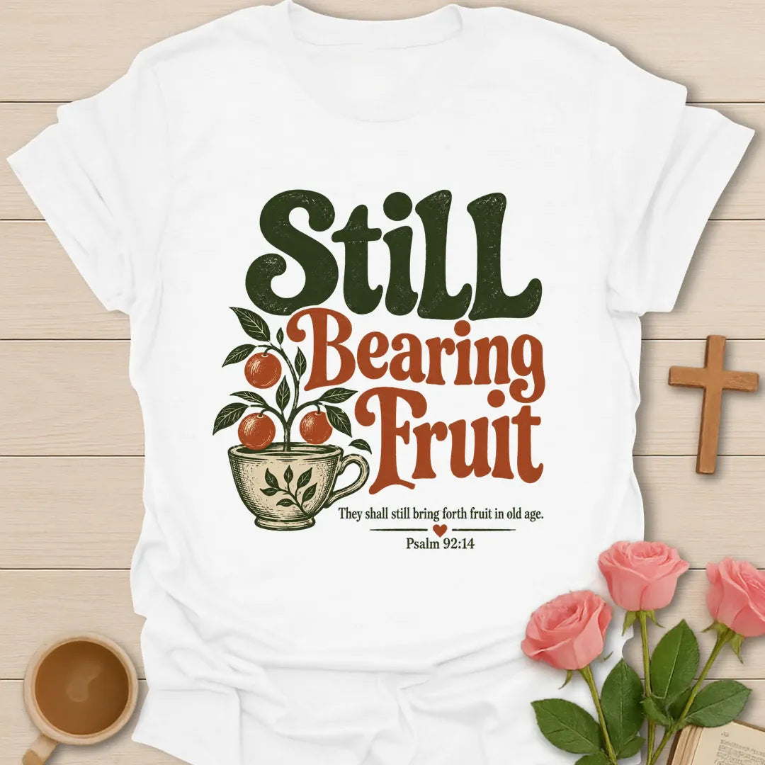 Still Bearing Fruit vintage Christian t-shirt with an orange fruit tree growing from a teacup and Psalm 92:14 - White