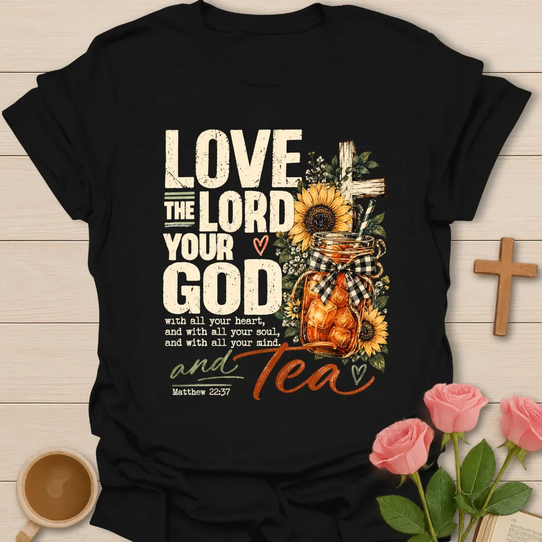 Love the Lord Your God and Tea Matthew 22:37 t-shirt with sunflowers, a wooden cross, and an iced tea mason jar with a gingham bow - Black