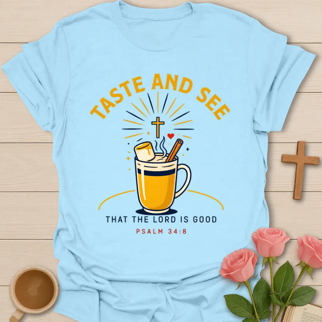 Taste And See tea shirt with steaming mug, marshmallow, cinnamon stick, cross, and sunburst. - Light Blue