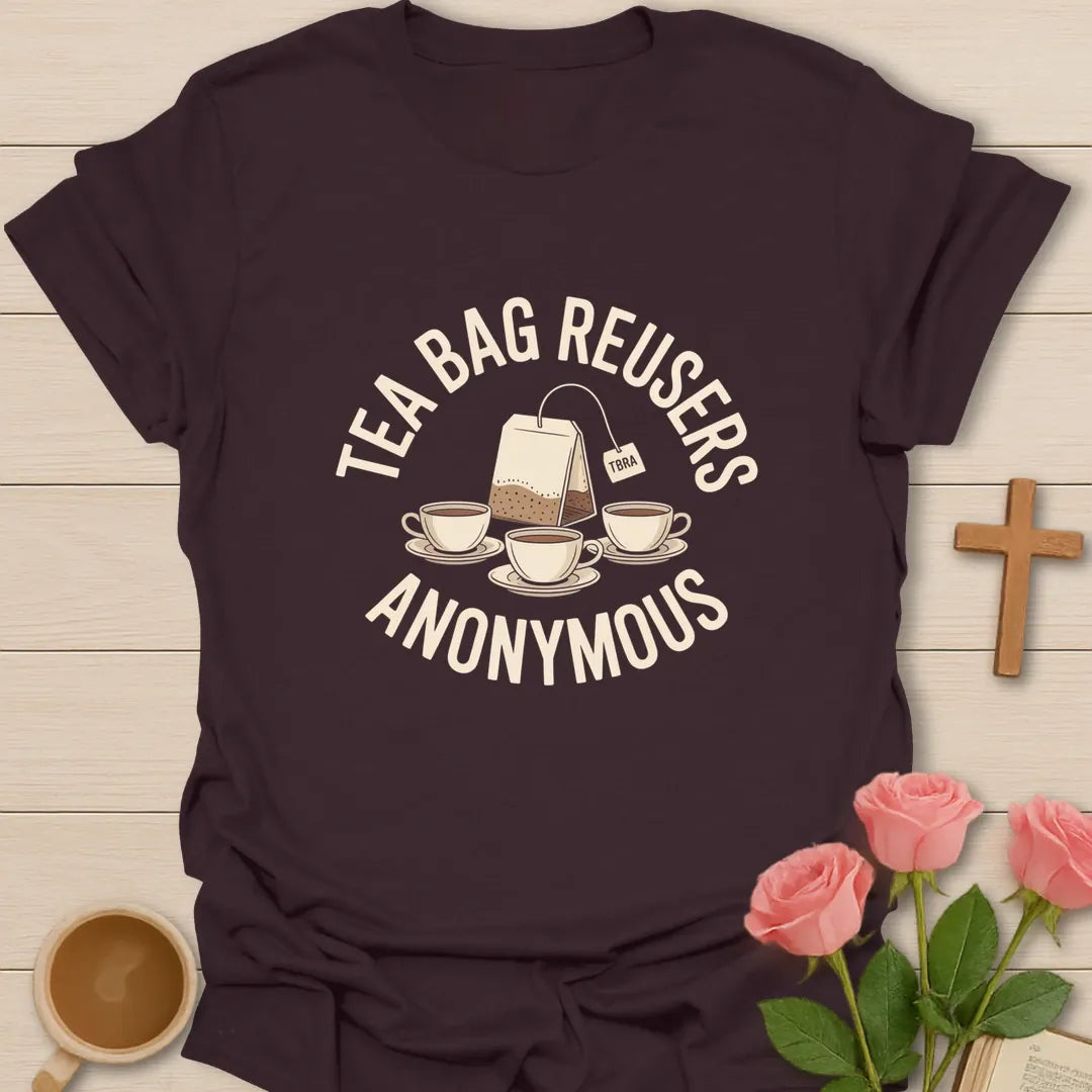 Tea Bag Reusers Anonymous shirt with playful lettering and faith-inspired tea design. - Dark Chocolate