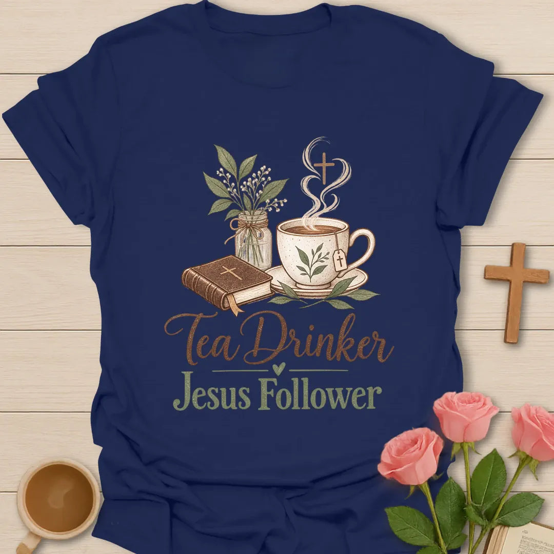 Tea Drinker Jesus Follower t-shirt with script lettering, a Bible, a teacup with cross-shaped steam and a jar of greenery. - Navy